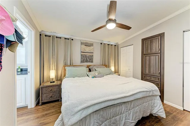 a bedroom with a bed and a dresser