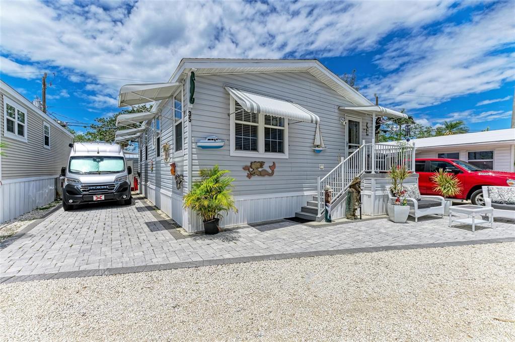 12507 Cortez Road West, Unit 35 Cortez, FL 34215 - Photo 5 of 36 a view of a car park in front of house