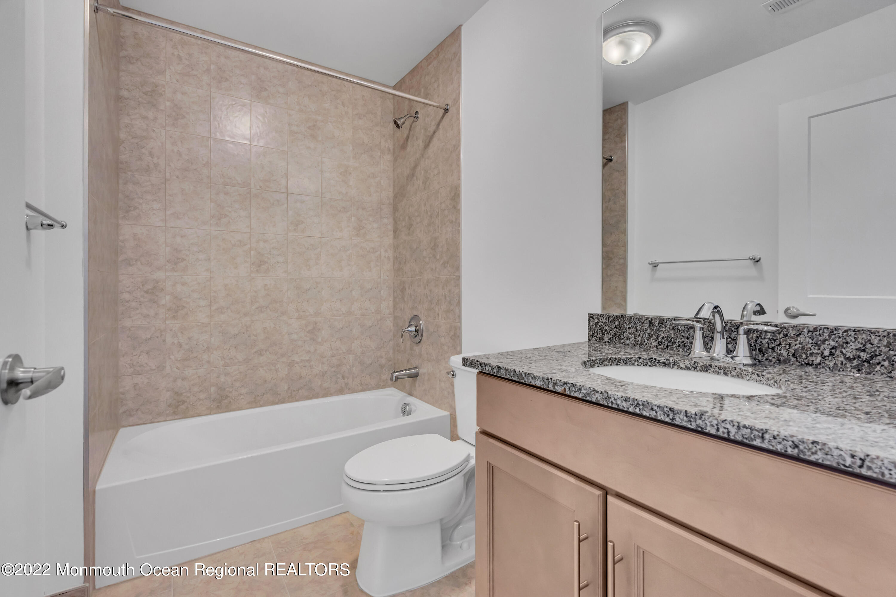 26 Kitchen Avenue Old Bridge, NJ 08857 - Photo 26 of 38 a bathroom with a granite countertop sink toilet and shower