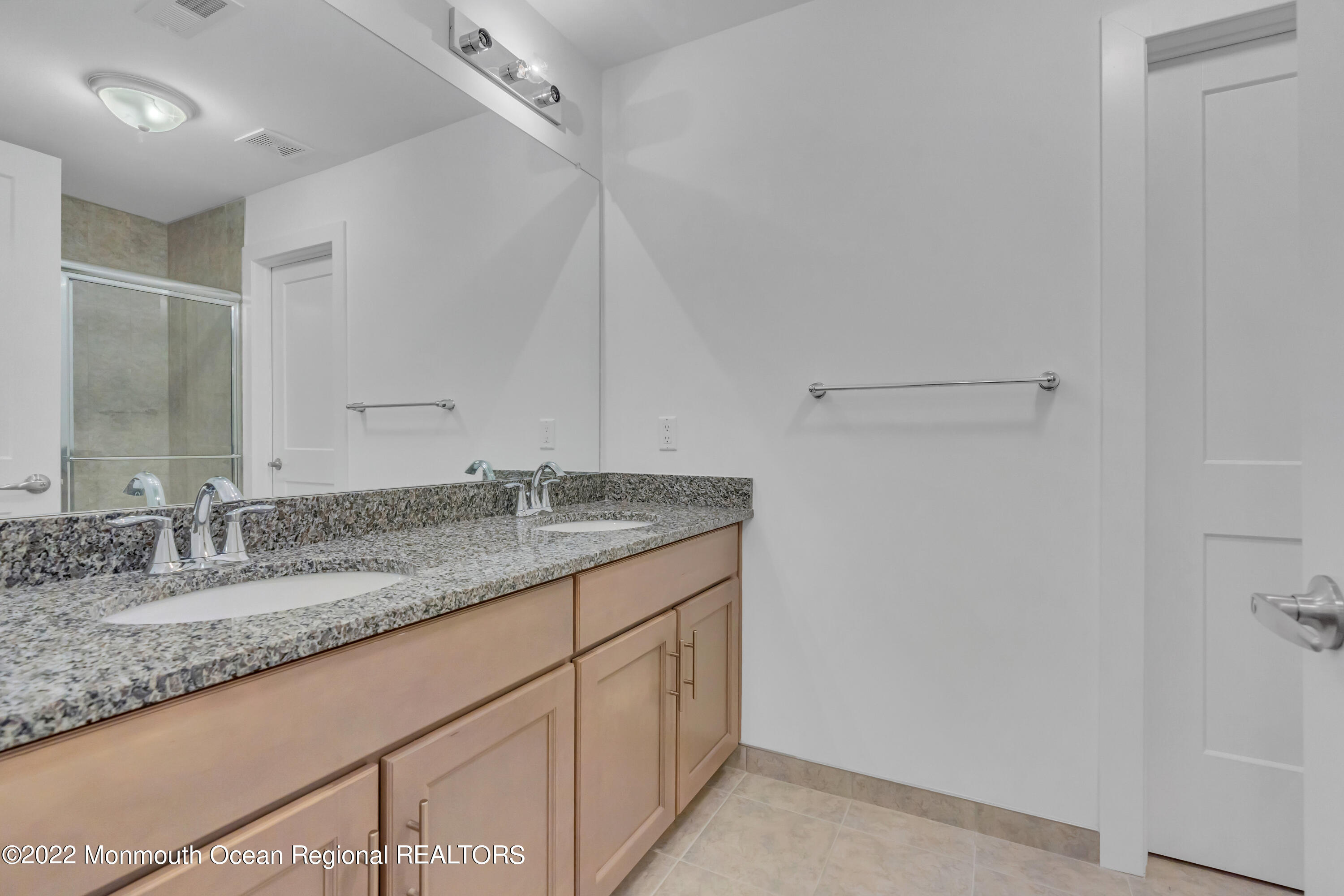 26 Kitchen Avenue Old Bridge, NJ 08857 - Photo 32 of 38 a bathroom with a granite countertop sink and a mirror