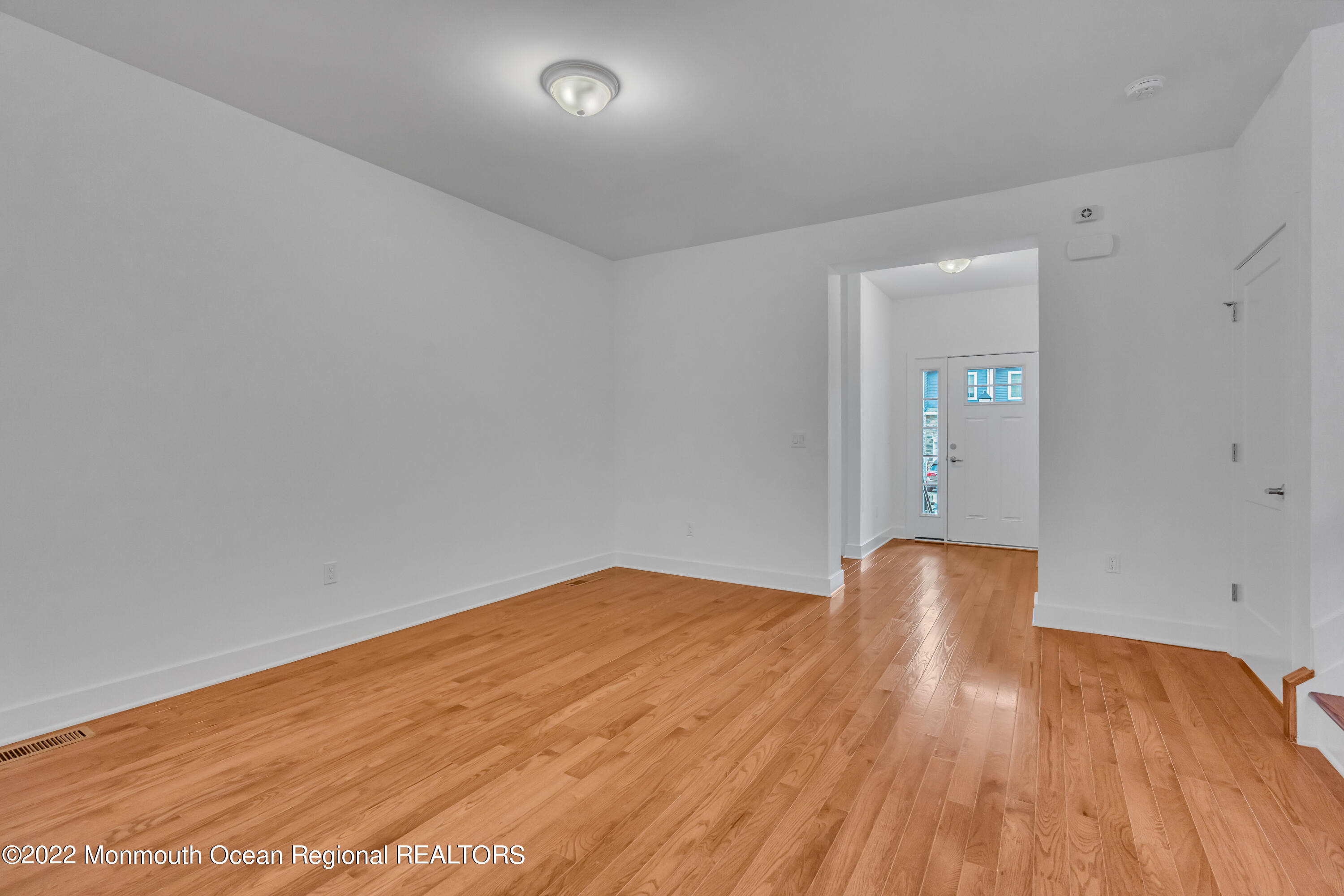 26 Kitchen Avenue Old Bridge, NJ 08857 - Photo 10 of 38 a view of empty room with wooden floor