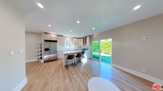 a view of kitchen with livingroom and furniture