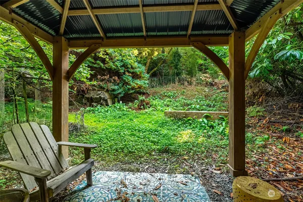 a view of backyard with green space