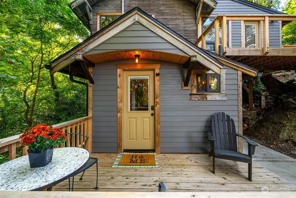 a backyard of a house with seating space