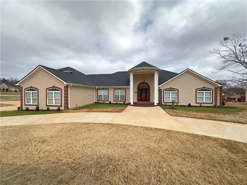 335 Canvasback Trail Locust Grove, GA 30248 - Photo 54 of 91 a view of house and yard with wooden fence