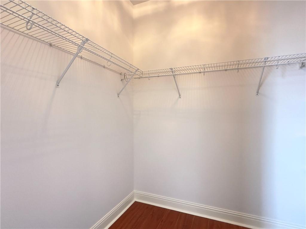 335 Canvasback Trail Locust Grove, GA 30248 - Photo 61 of 91 a view of a room with racks on the wall