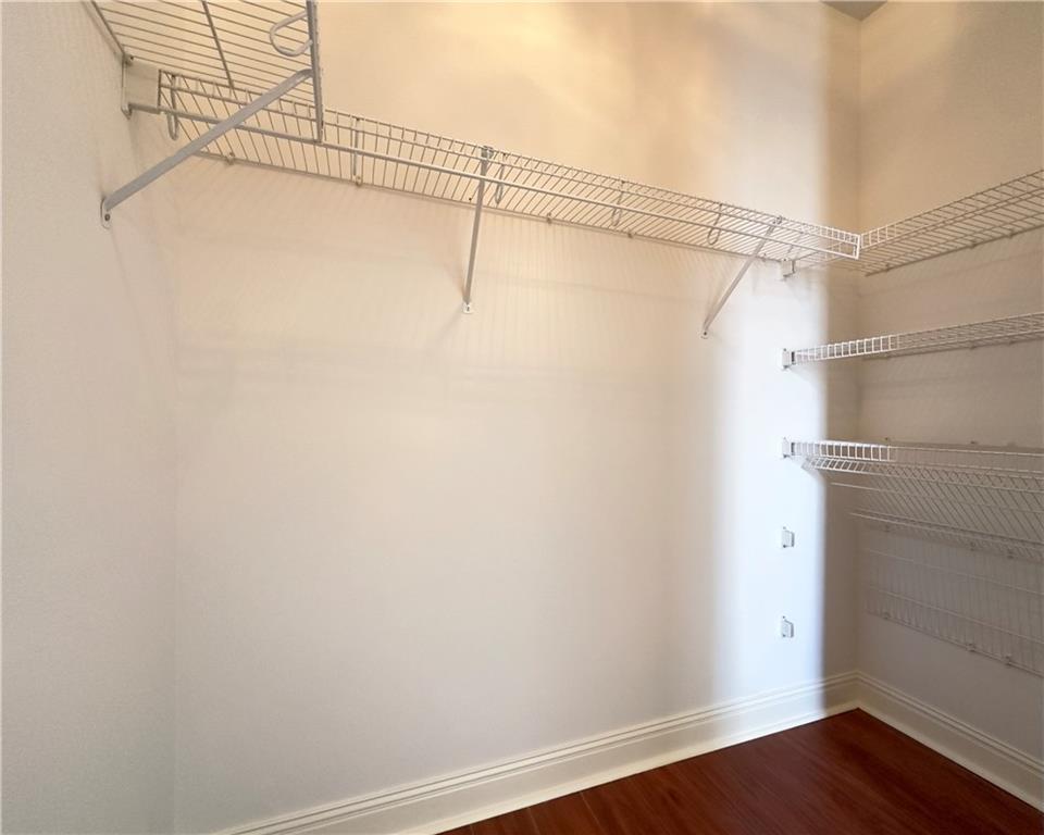 335 Canvasback Trail Locust Grove, GA 30248 - Photo 62 of 91 a view of a room with racks on the wall