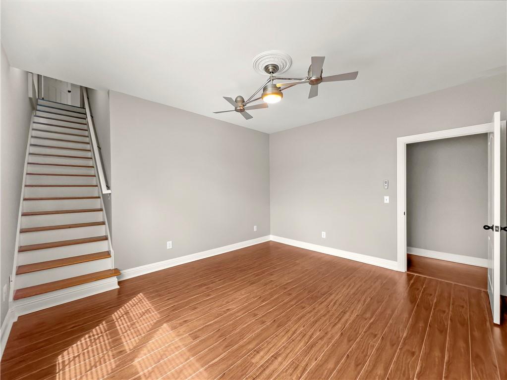 335 Canvasback Trail Locust Grove, GA 30248 - Photo 81 of 91 a view of an empty room with wooden floor
