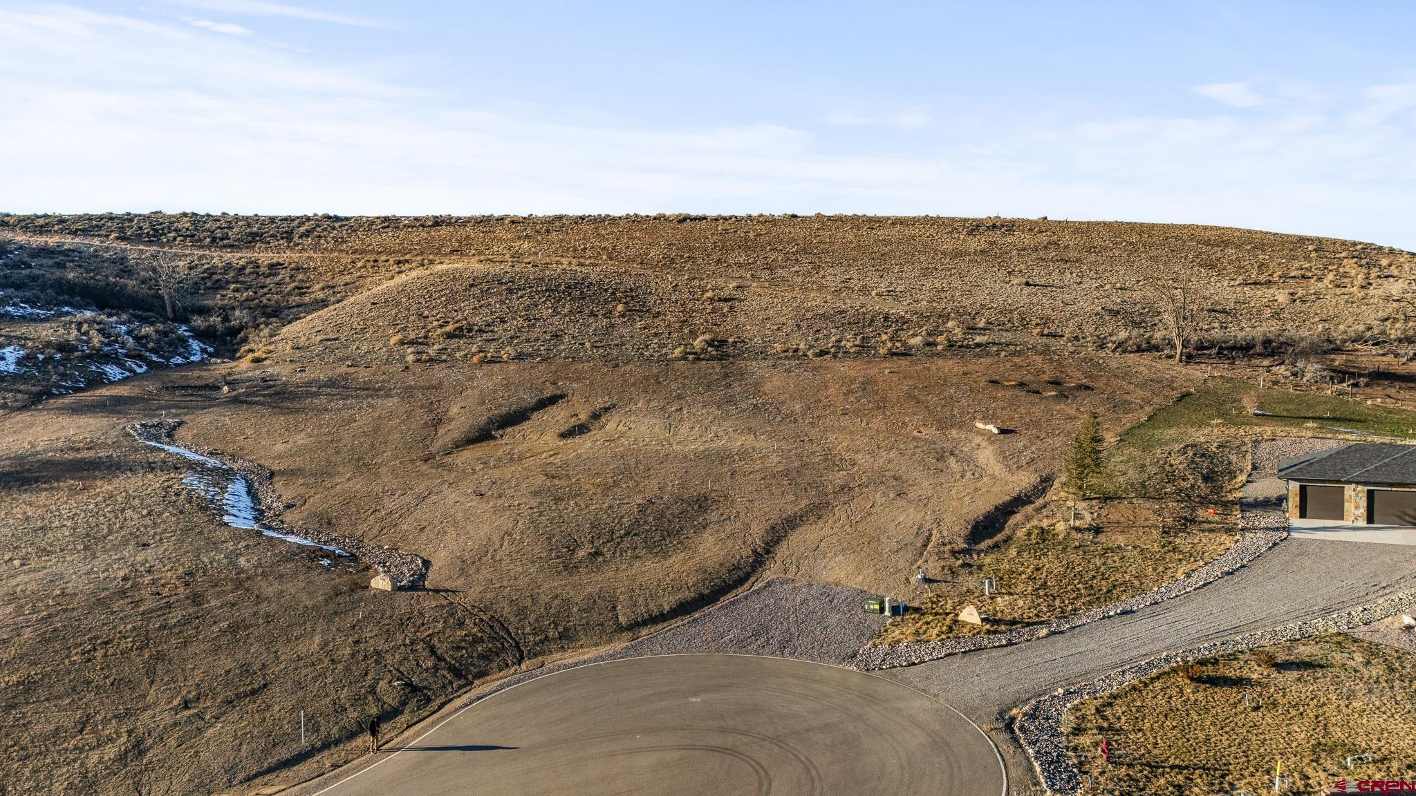 Lot 9 Lone Eagle Road Montrose, CO 81403 - Photo 5 of 21 an aerial view of houses with beach