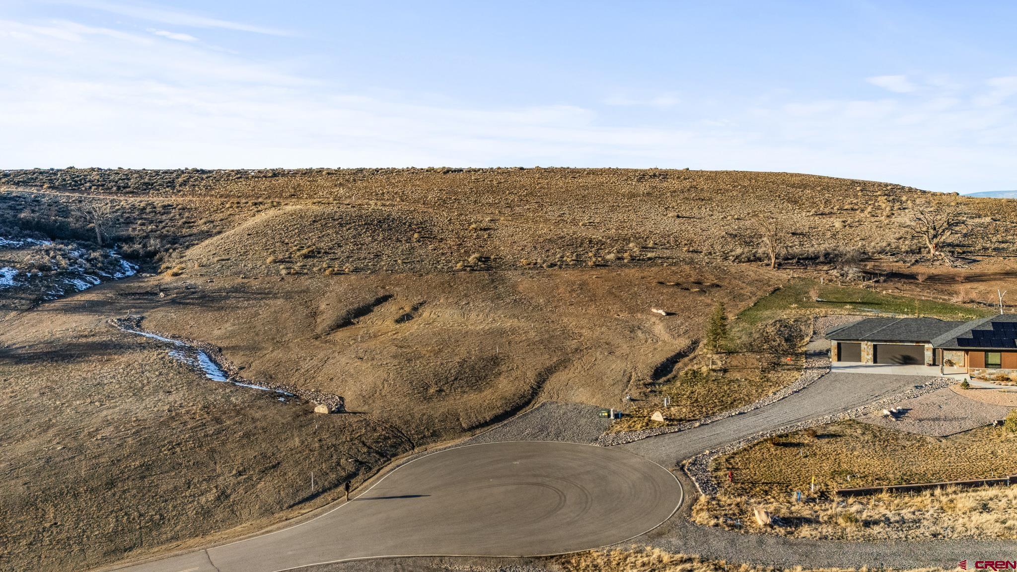 Lot 9 Lone Eagle Road Montrose, CO 81403 - Photo 7 of 21 an aerial view of residential houses with outdoor space