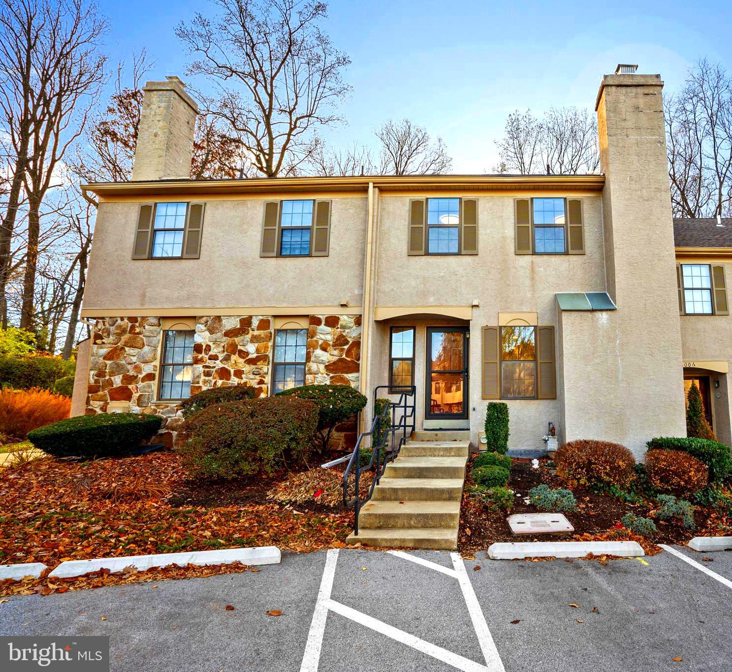 1007 Stoneham Drive, Unit 1007B Newtown Square, PA 19073 - Photo 1 of 31 a front view of a house