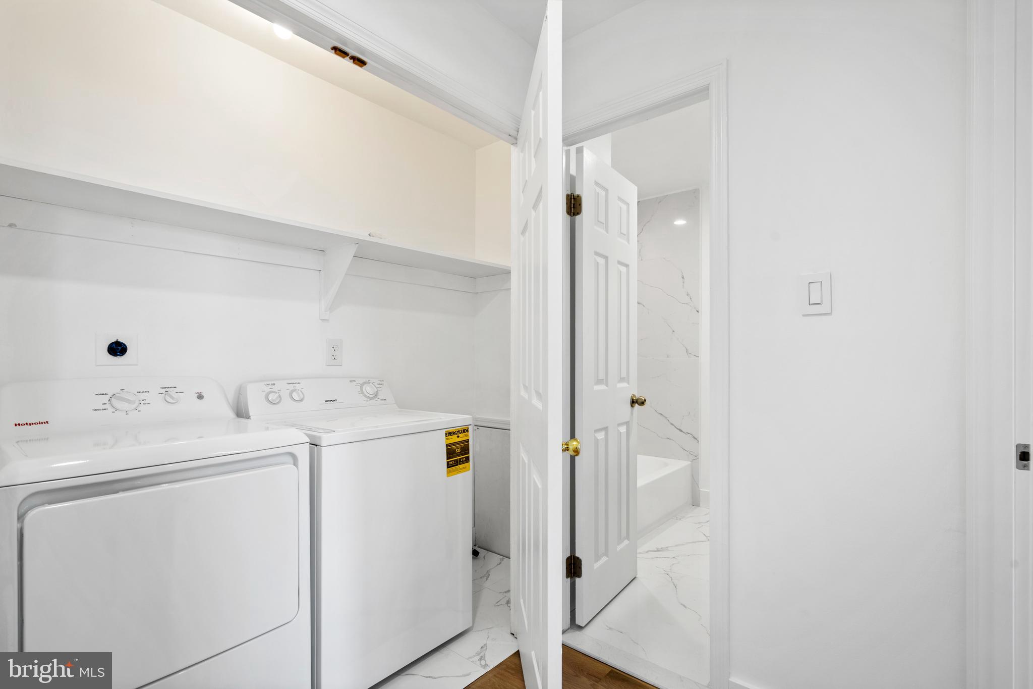 1007 Stoneham Drive, Unit 1007B Newtown Square, PA 19073 - Photo 15 of 31 a utility room with dryer and washer