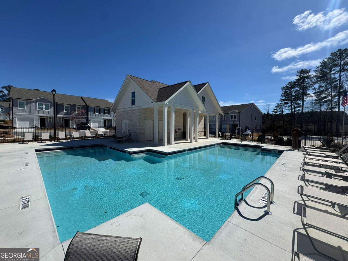 423 Towson Street, Unit 233 Villa Rica, GA 30180 - Photo 16 of 18 a house view with a garden space