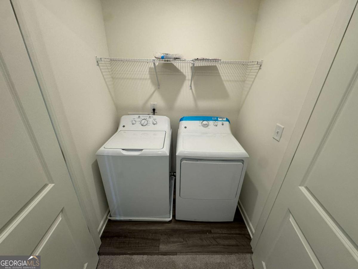 423 Towson Street, Unit 233 Villa Rica, GA 30180 - Photo 8 of 18 a utility room with dryer and washer