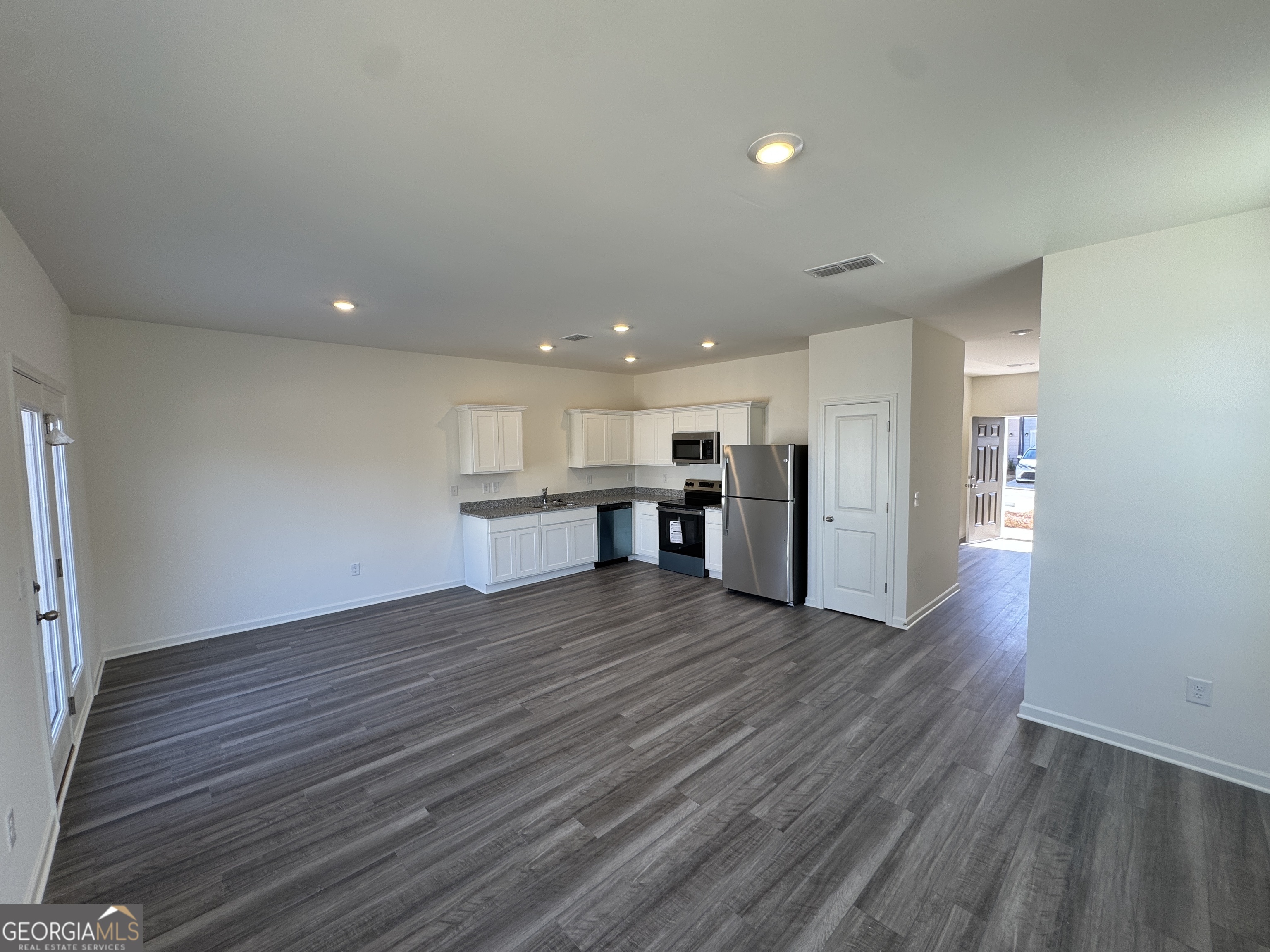 423 Towson Street, Unit 233 Villa Rica, GA 30180 - Photo 9 of 18 a view of kitchen with wooden floor