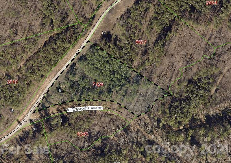 182 Pilot Ridge Road, Unit 9 Nebo, NC 28761 - Photo 1 of 32 a view of a yard with a tree