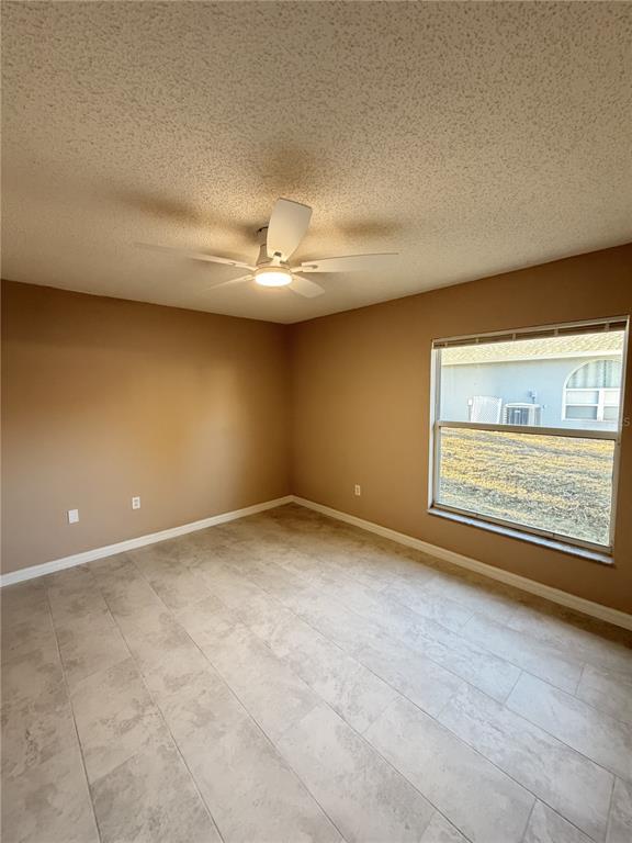 4 Wheeldon Lane Palm Coast, FL 32164 - Photo 10 of 21 a view of an empty room with a window