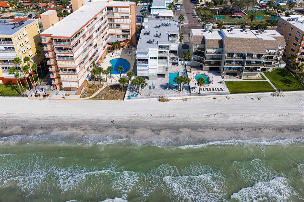 16332 Gulf Boulevard, Unit 3B Redington Beach, FL 33708 - Photo 82 of 91 a view of multiple houses with outdoor space