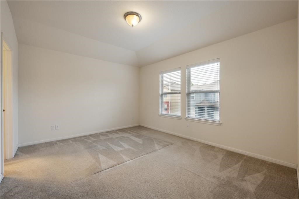 5428 Falling Leaf Lane, Unit 87 Austin, TX 78744 - Photo 13 of 31 an empty room with a window