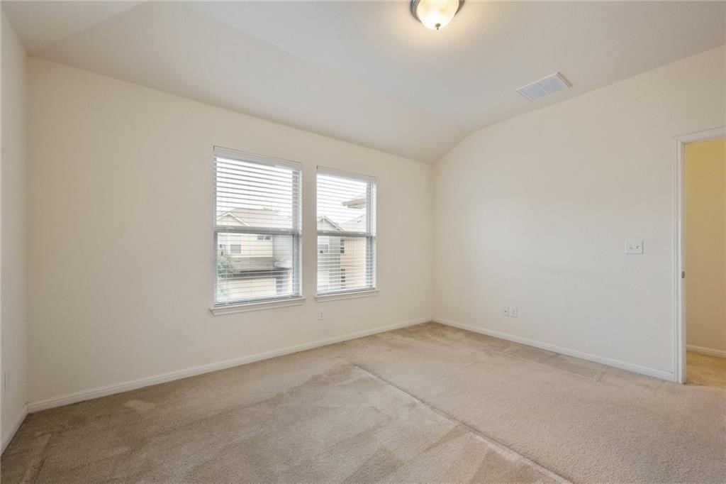 5428 Falling Leaf Lane, Unit 87 Austin, TX 78744 - Photo 15 of 31 an empty room with a window