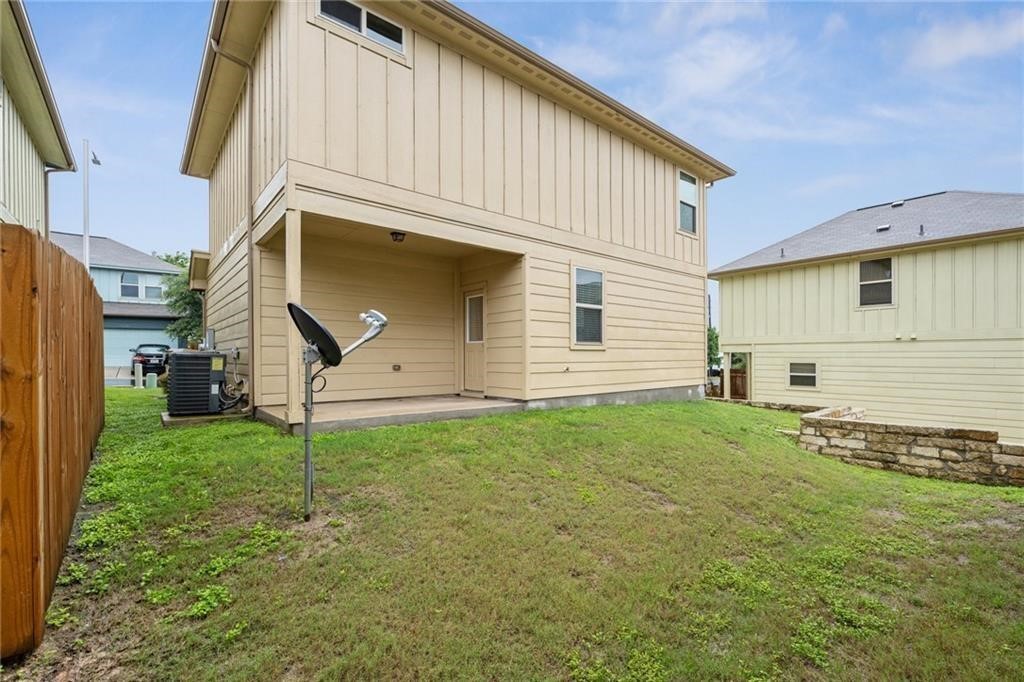5428 Falling Leaf Lane, Unit 87 Austin, TX 78744 - Photo 28 of 31 a view of a backyard of the house