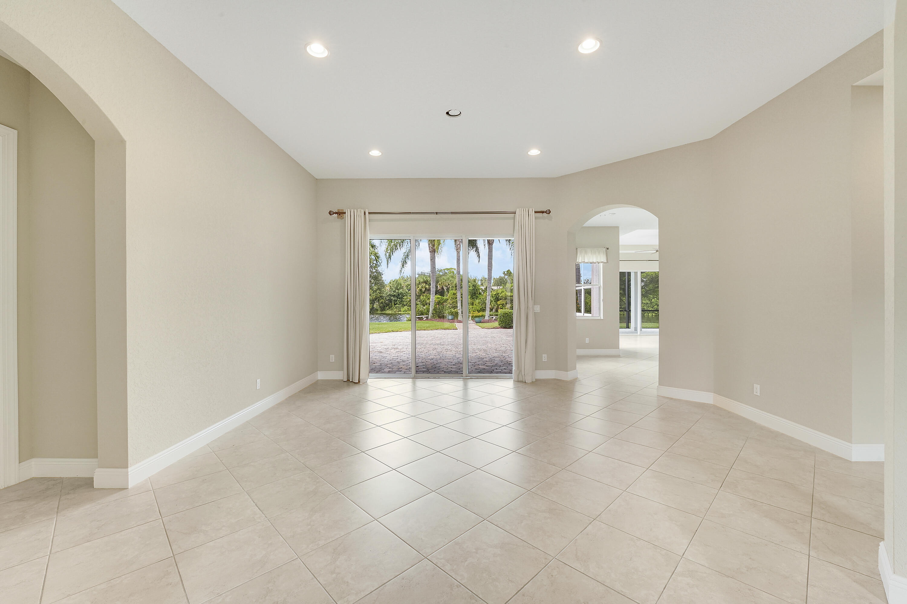 243 Southeast Ethan Terrace Stuart, FL 34997 - Photo 13 of 58 a view of an empty room with a window