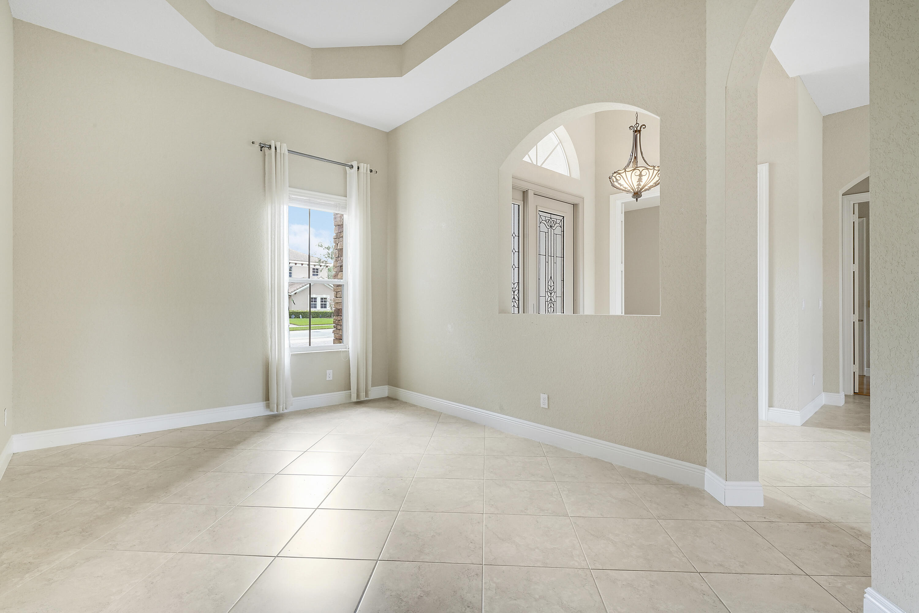243 Southeast Ethan Terrace Stuart, FL 34997 - Photo 17 of 58 an empty room with windows and closet