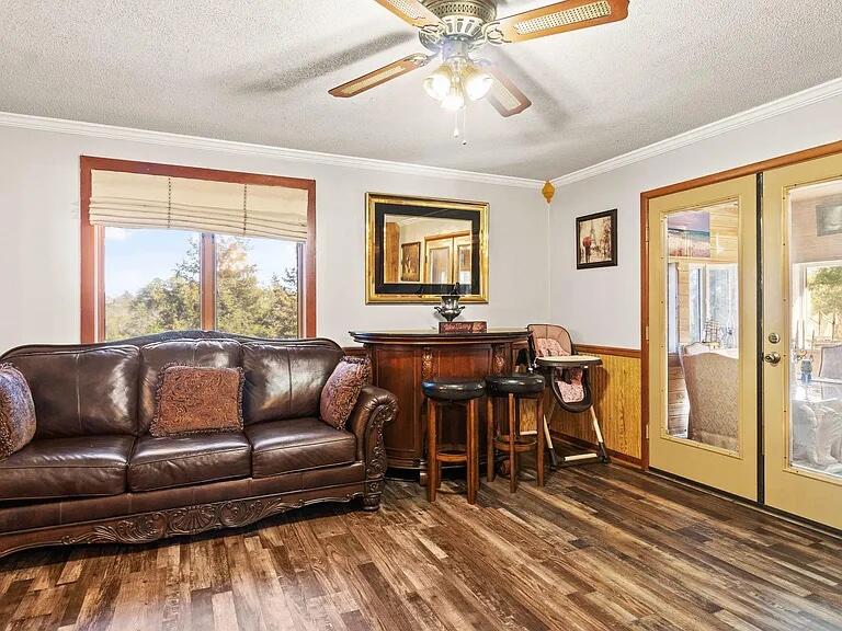 3194 Bay Ridge Drive Crestview, FL 32539 - Photo 30 of 88 a living room with furniture and a large window