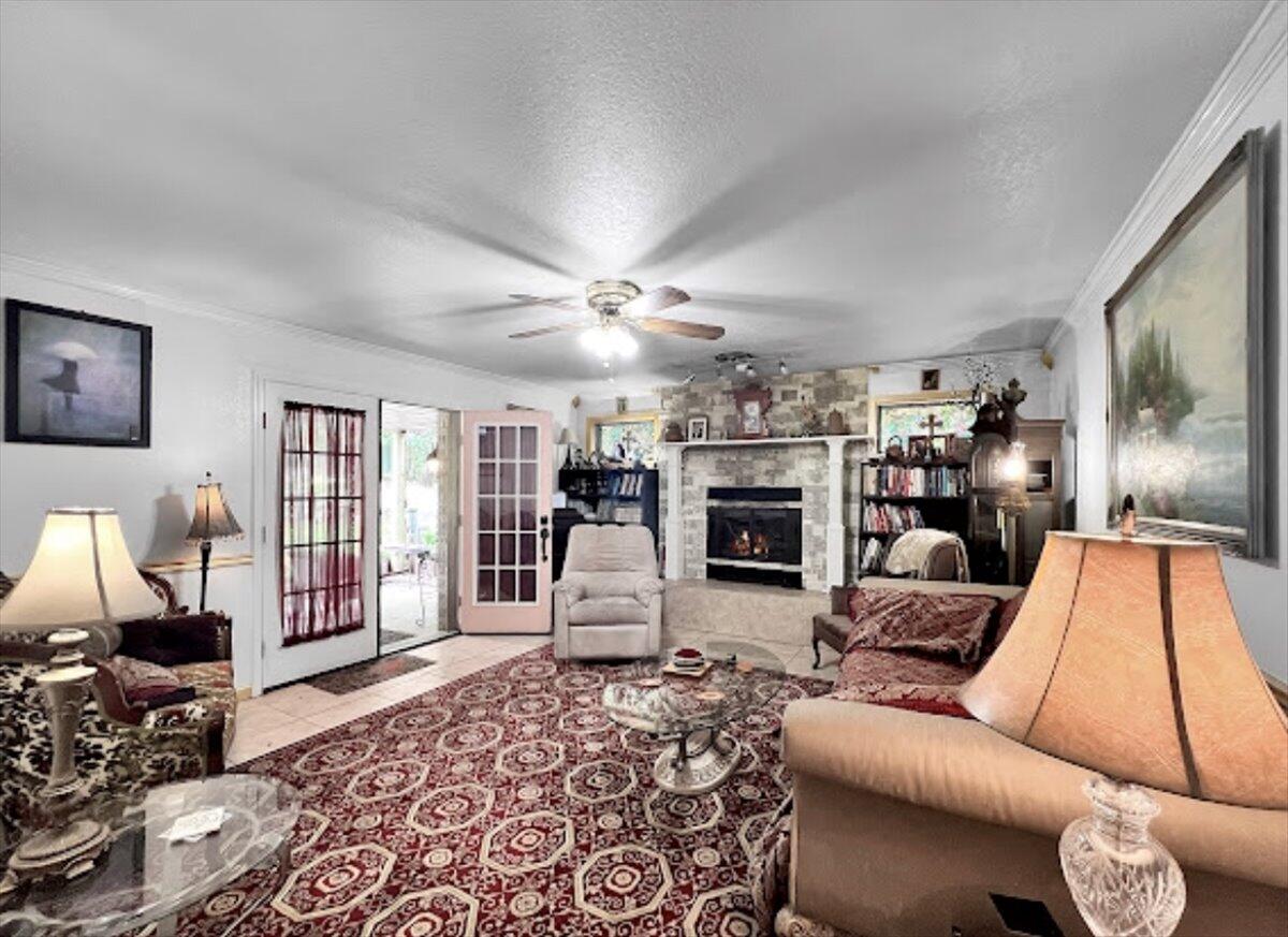 3194 Bay Ridge Drive Crestview, FL 32539 - Photo 8 of 88 a living room with furniture and a flat screen tv