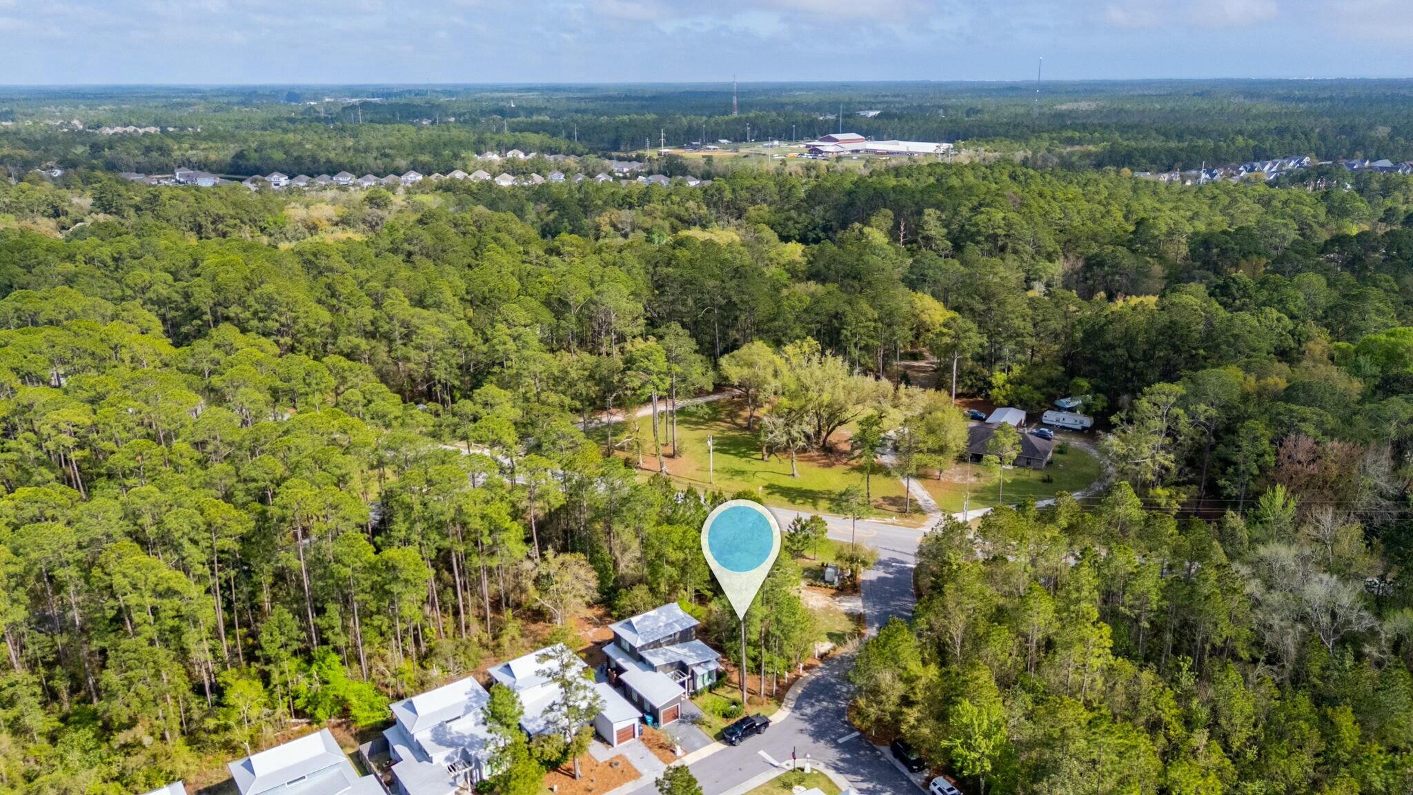 Lot 6 Edens Landing Circle Santa Rosa Beach, FL 32459 - Photo 6 of 14 a view of a yard with an outdoor seating