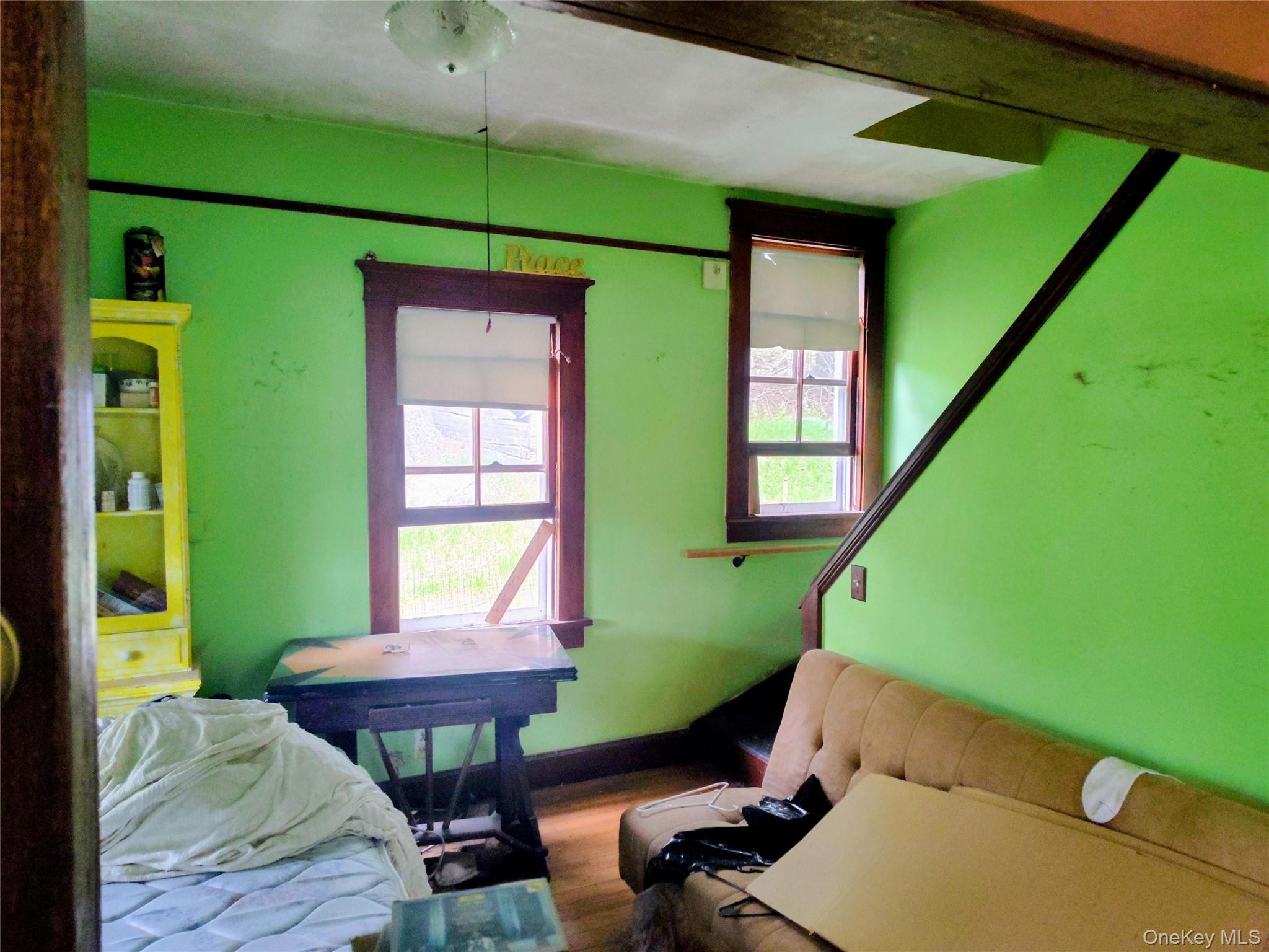 174 Forestburgh Road Forestburgh, NY 12777 - Photo 8 of 28 a room with furniture and a window