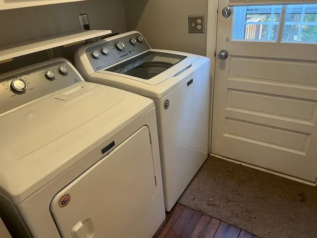 a utility room with dryer and washer