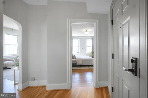 a view of a bedroom from a hallway