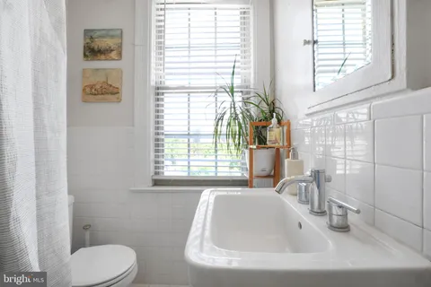 a bathroom with a sink and a toilet