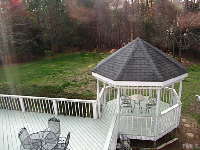 12613 Waterman Drive Raleigh, NC 27614 - Photo 20 of 25 View of backyard lot. Spacious deck for grilling and entertaining friends. How about dining in the gazebo! Such a special touch! Back Yard