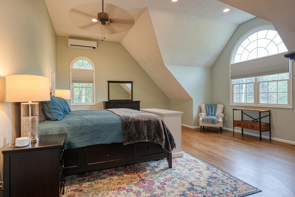 3 Alcorn Road Chelmsford, MA 01824 - Photo 14 of 39 a bedroom with a bed lamps and a mirror