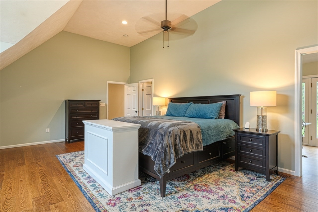 3 Alcorn Road Chelmsford, MA 01824 - Photo 16 of 39 a bedroom with a bed and wooden floor