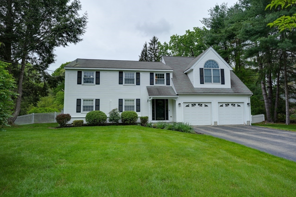 3 Alcorn Road Chelmsford, MA 01824 - Photo 38 of 39 a front view of a house with a yard