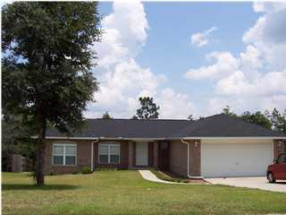 front view of house with a yard