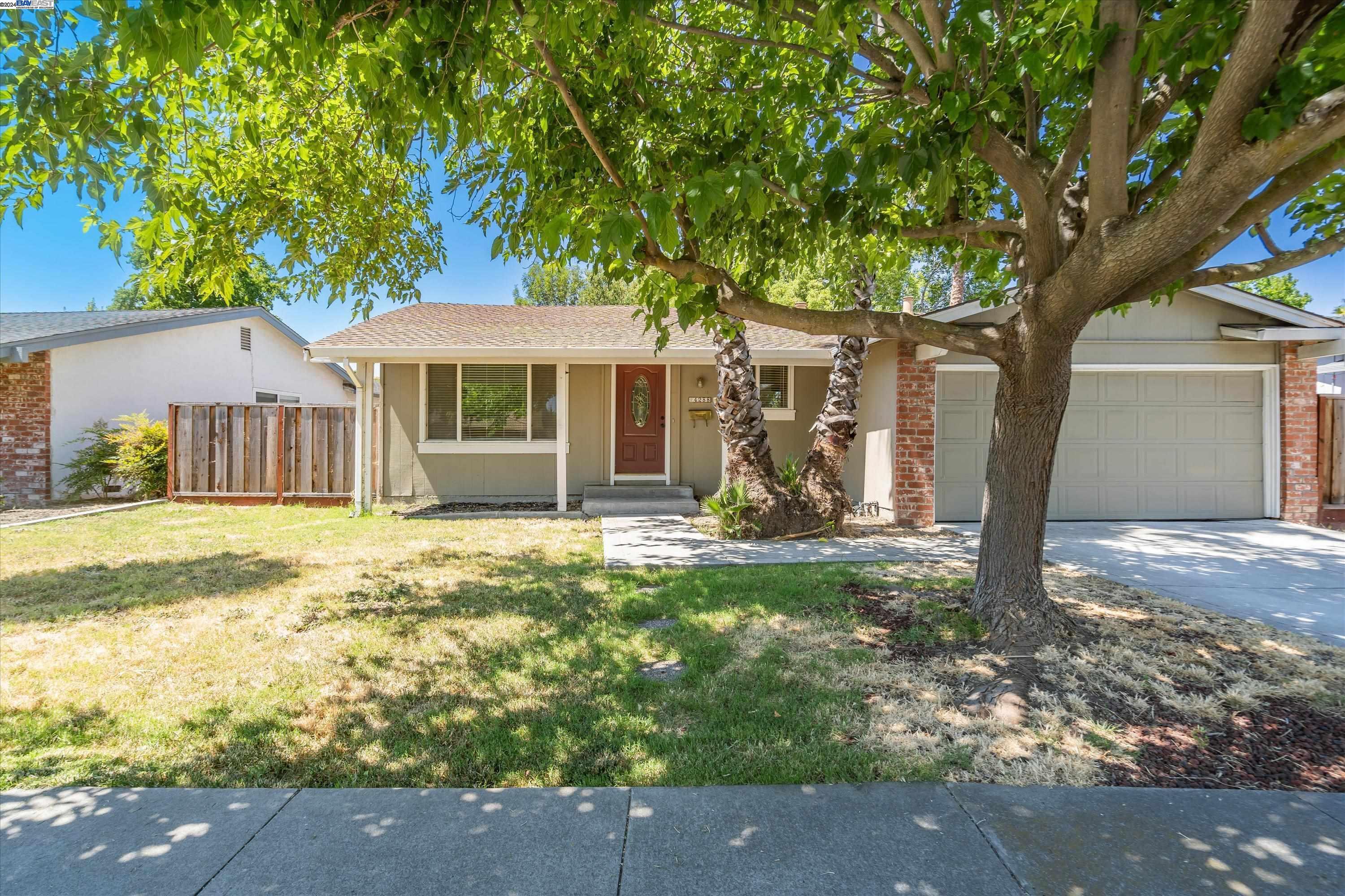4288 Dorman Road Pleasanton, CA 94588 - Photo 1 of 1 a view of a house with backyard and a tree