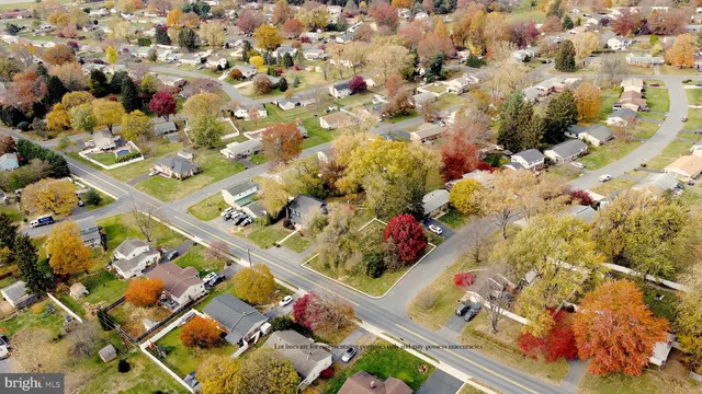 a view of a playground with basketball court