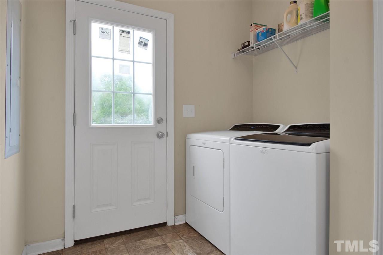 1298 L L Cooper Road Cameron, NC 28326 - Photo 15 of 30 a utility room with dryer and washer