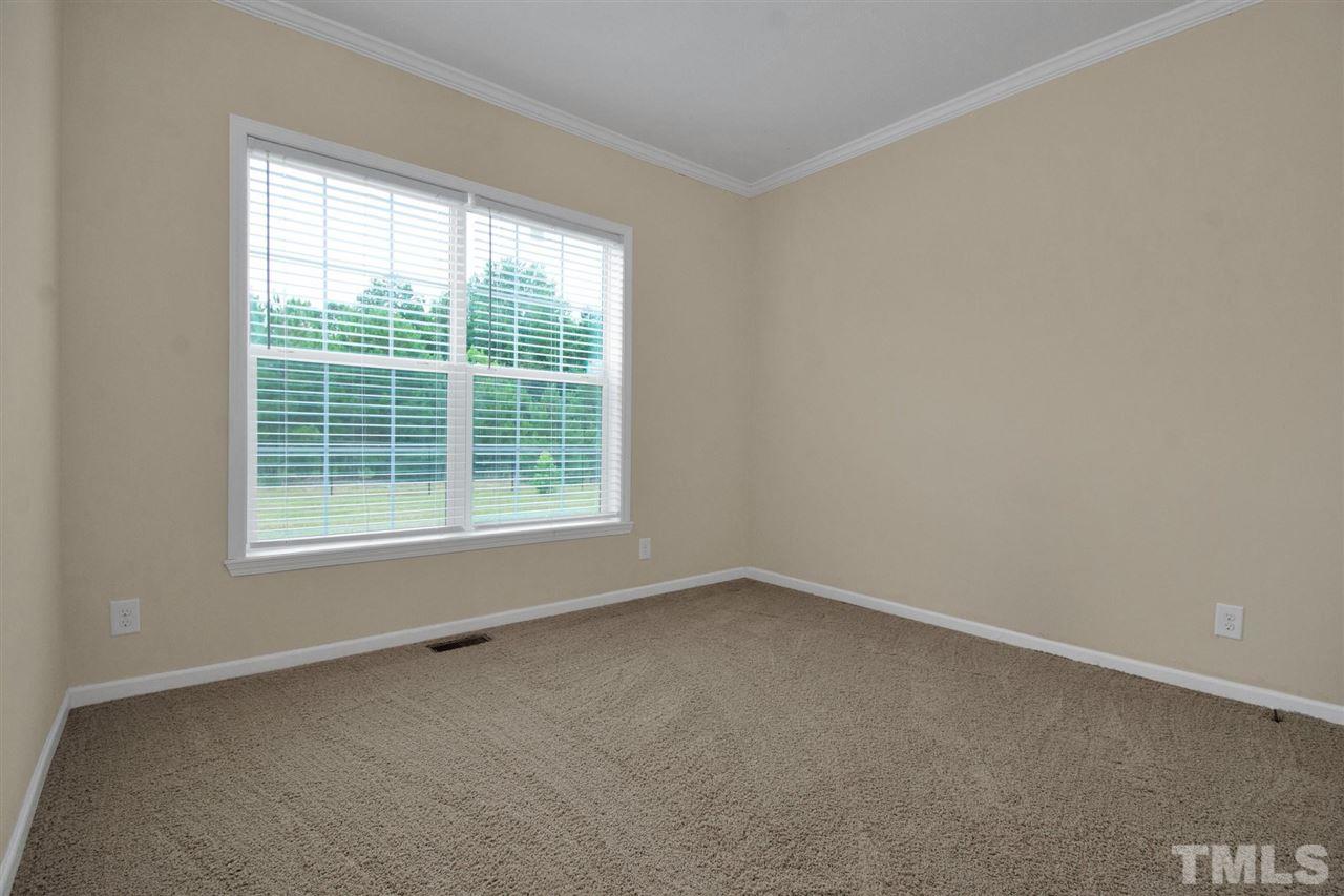 1298 L L Cooper Road Cameron, NC 28326 - Photo 23 of 30 an empty room with a window