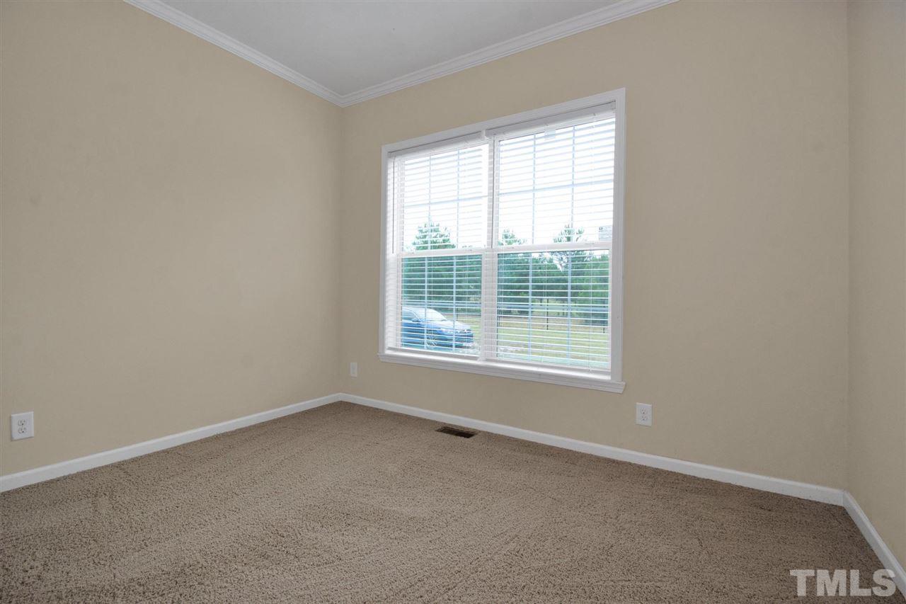 1298 L L Cooper Road Cameron, NC 28326 - Photo 25 of 30 an empty room with a window