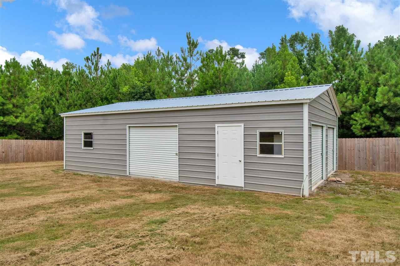1298 L L Cooper Road Cameron, NC 28326 - Photo 28 of 30 a view of a backyard