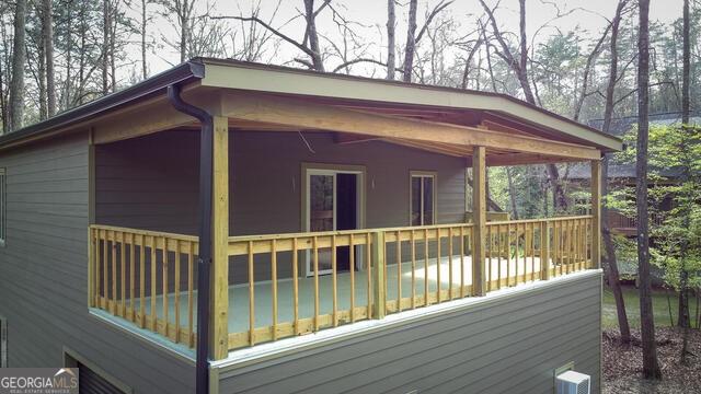 1088 Little Hawk Road Sautee Nacoochee, GA 30571 - Photo 75 of 75 a view of a house with a wooden deck