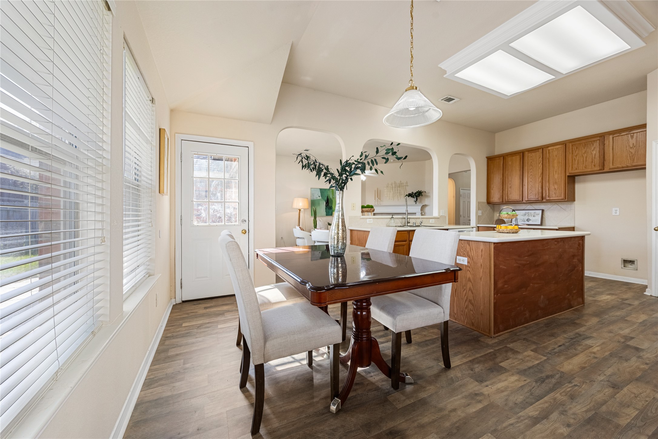 18739 Appletree Ridge Road Houston, TX 77084 - Photo 13 of 34 a view of a dining room with furniture and a chandelier