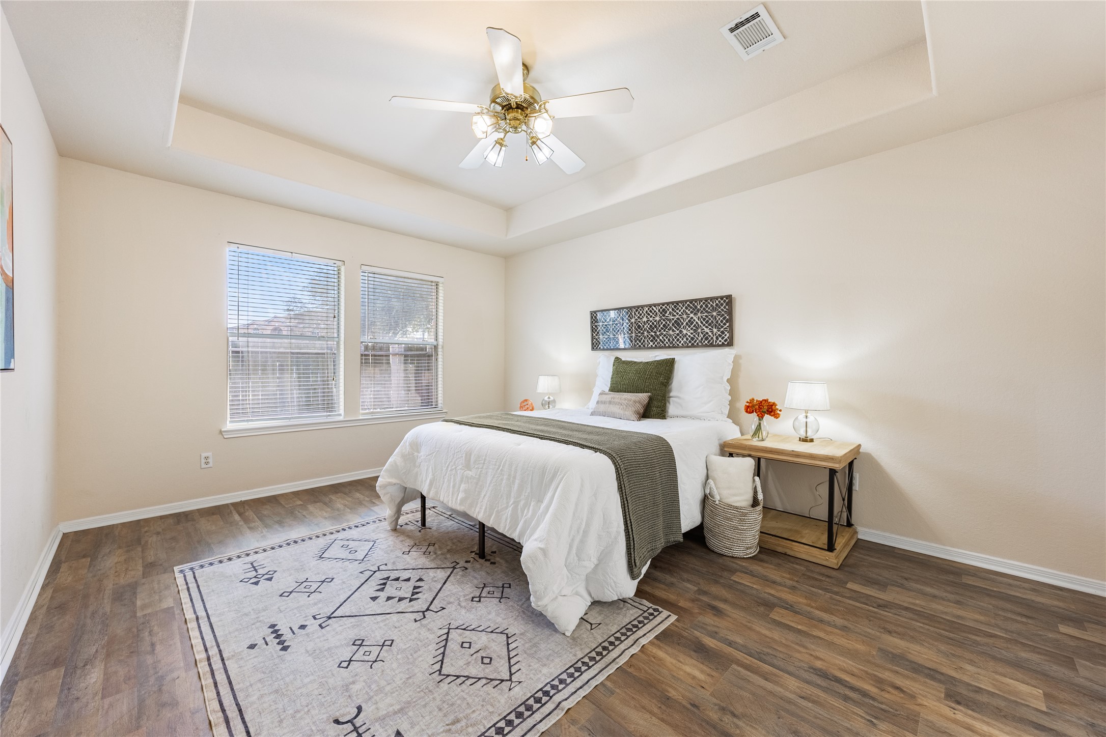 18739 Appletree Ridge Road Houston, TX 77084 - Photo 15 of 34 a bedroom with a large bed and a window