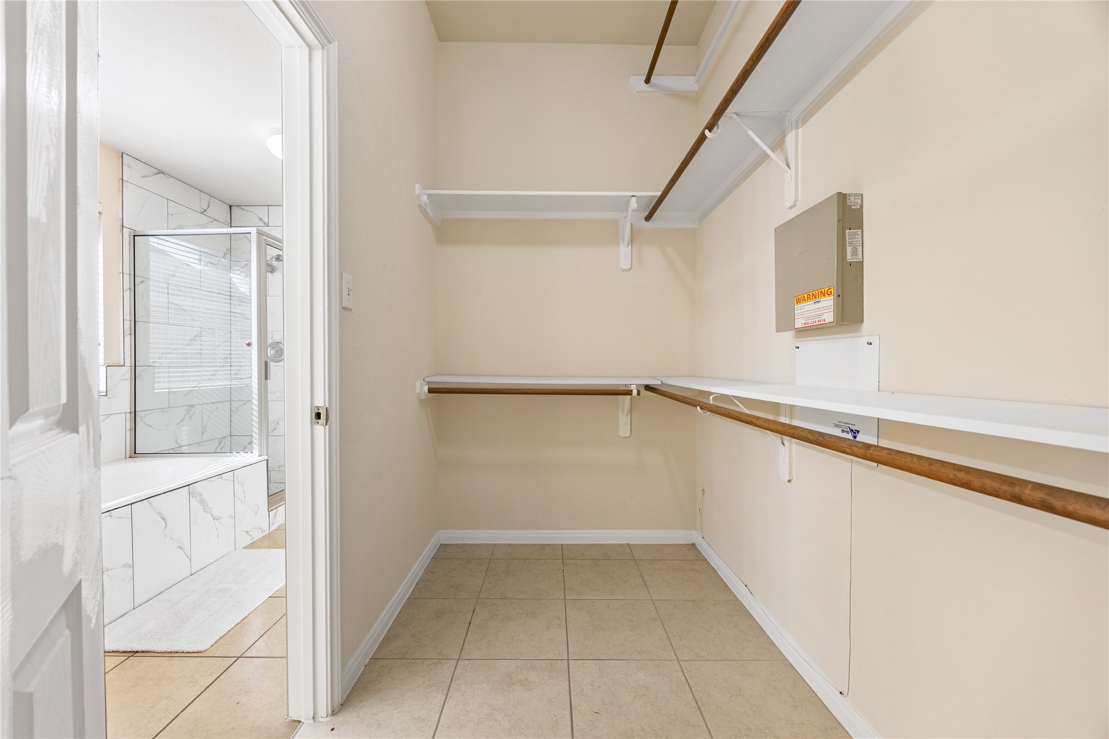 18739 Appletree Ridge Road Houston, TX 77084 - Photo 19 of 34 a view of an empty walk in closet