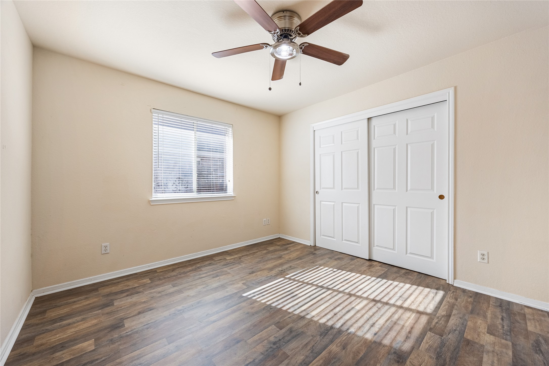 18739 Appletree Ridge Road Houston, TX 77084 - Photo 20 of 34 wooden floor in an empty room with a window